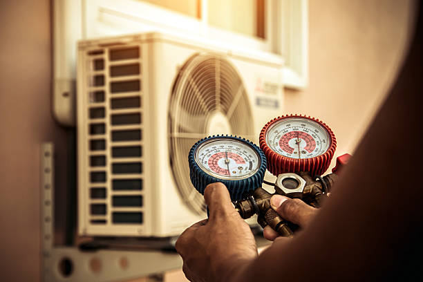 Professional Air Conditioning Service technician working in Portsmouth, NH
